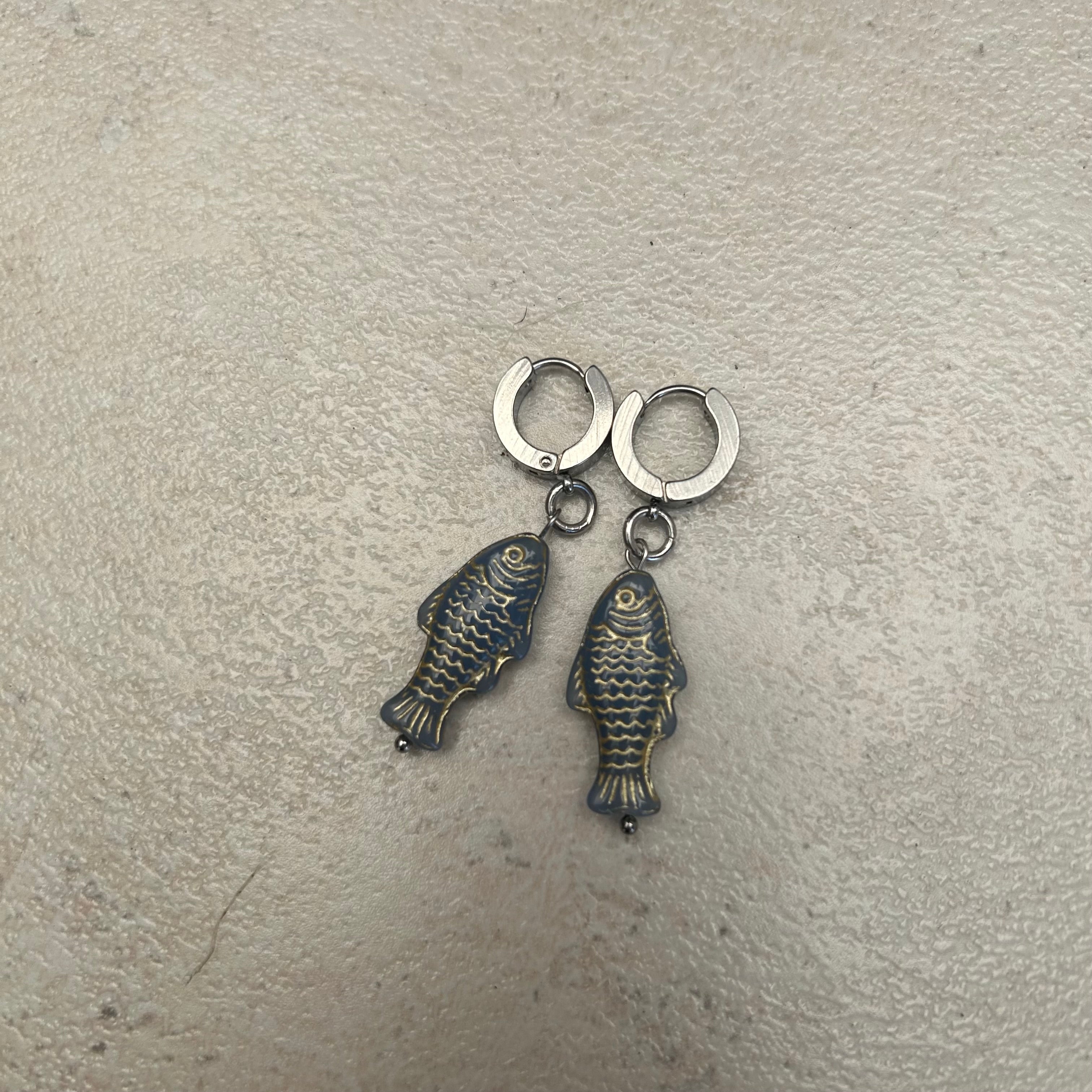 Gold on grey stainless fish