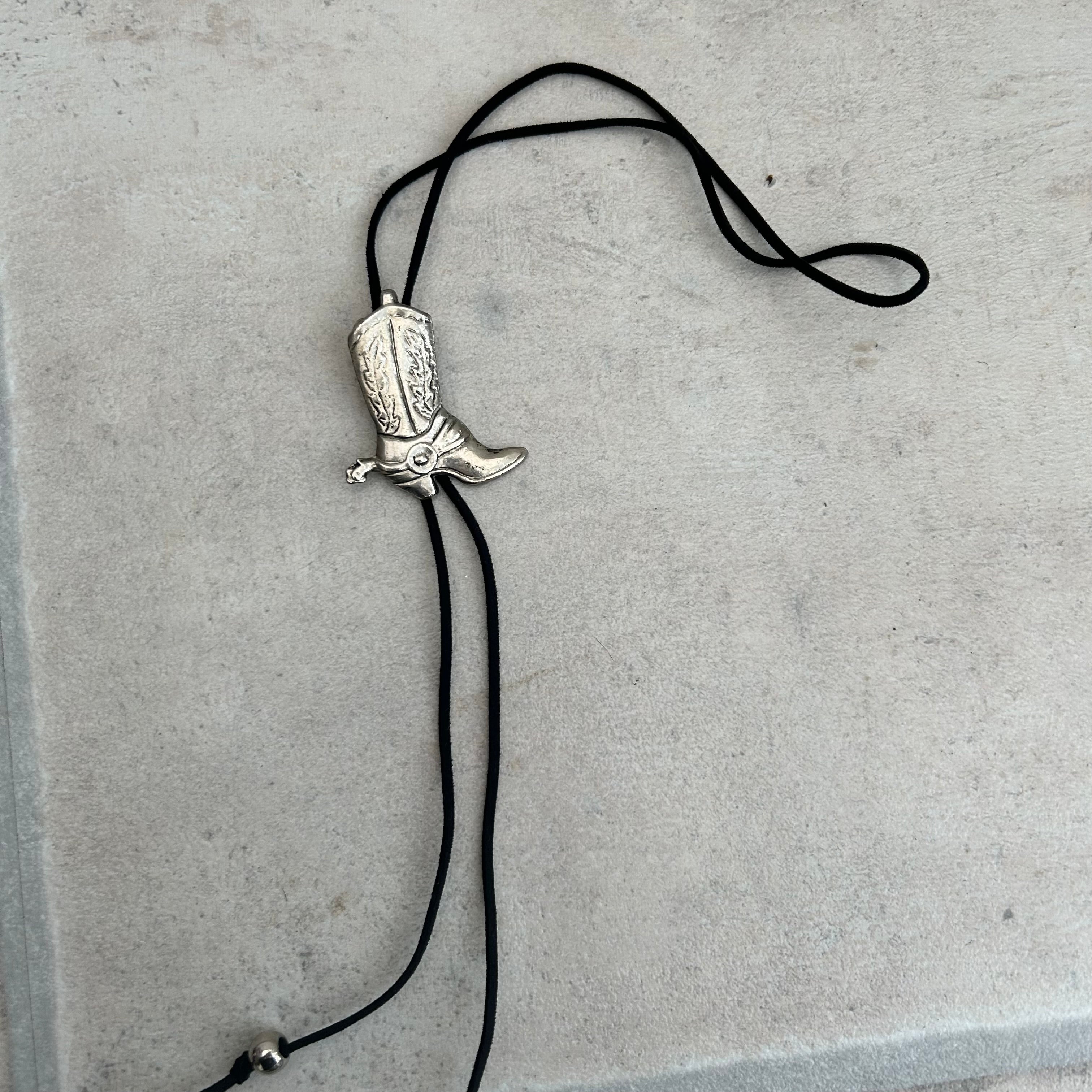 Handmade bolo tie with vintage cowboy boot pendant and upcycled beads