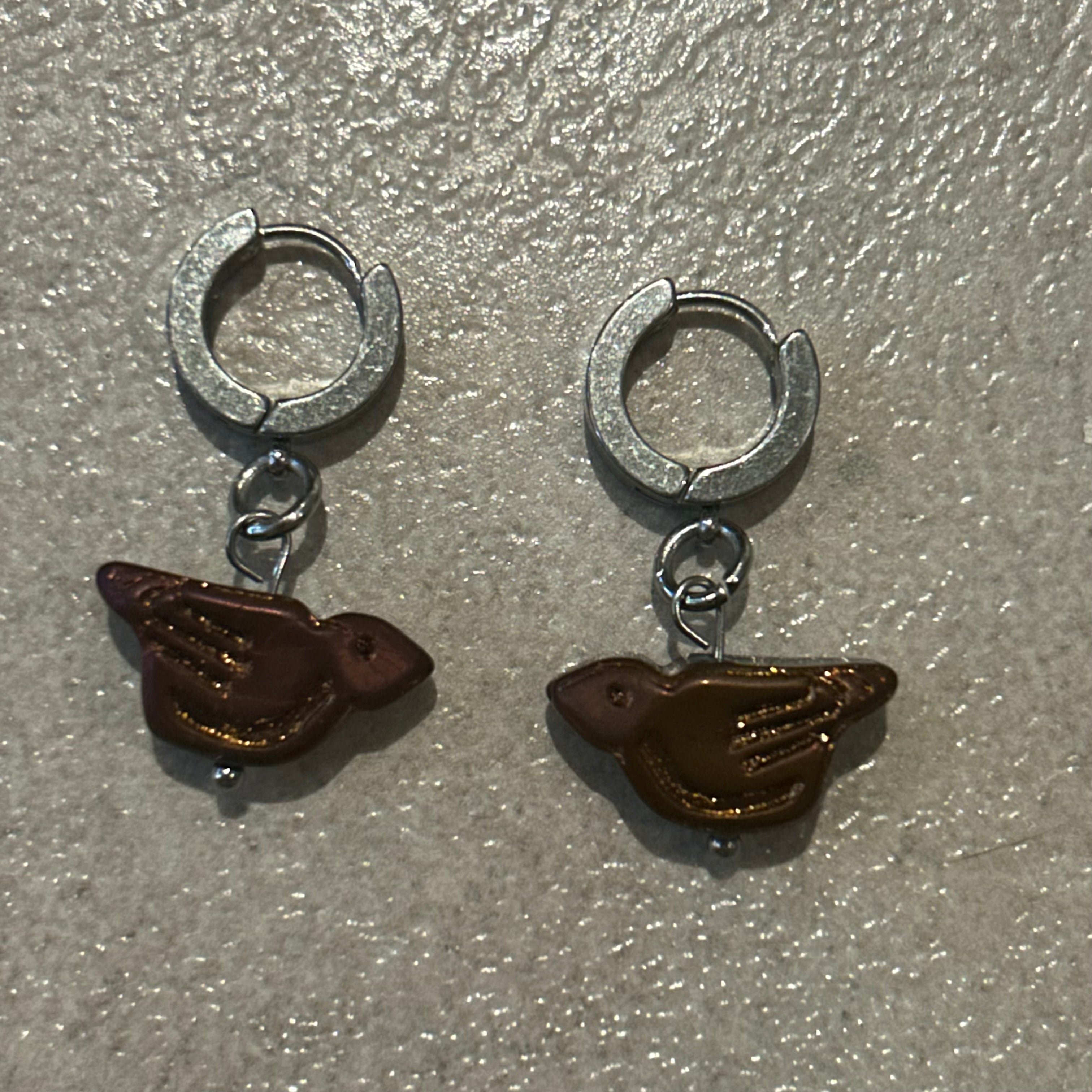 Bronze orange bird Huggies