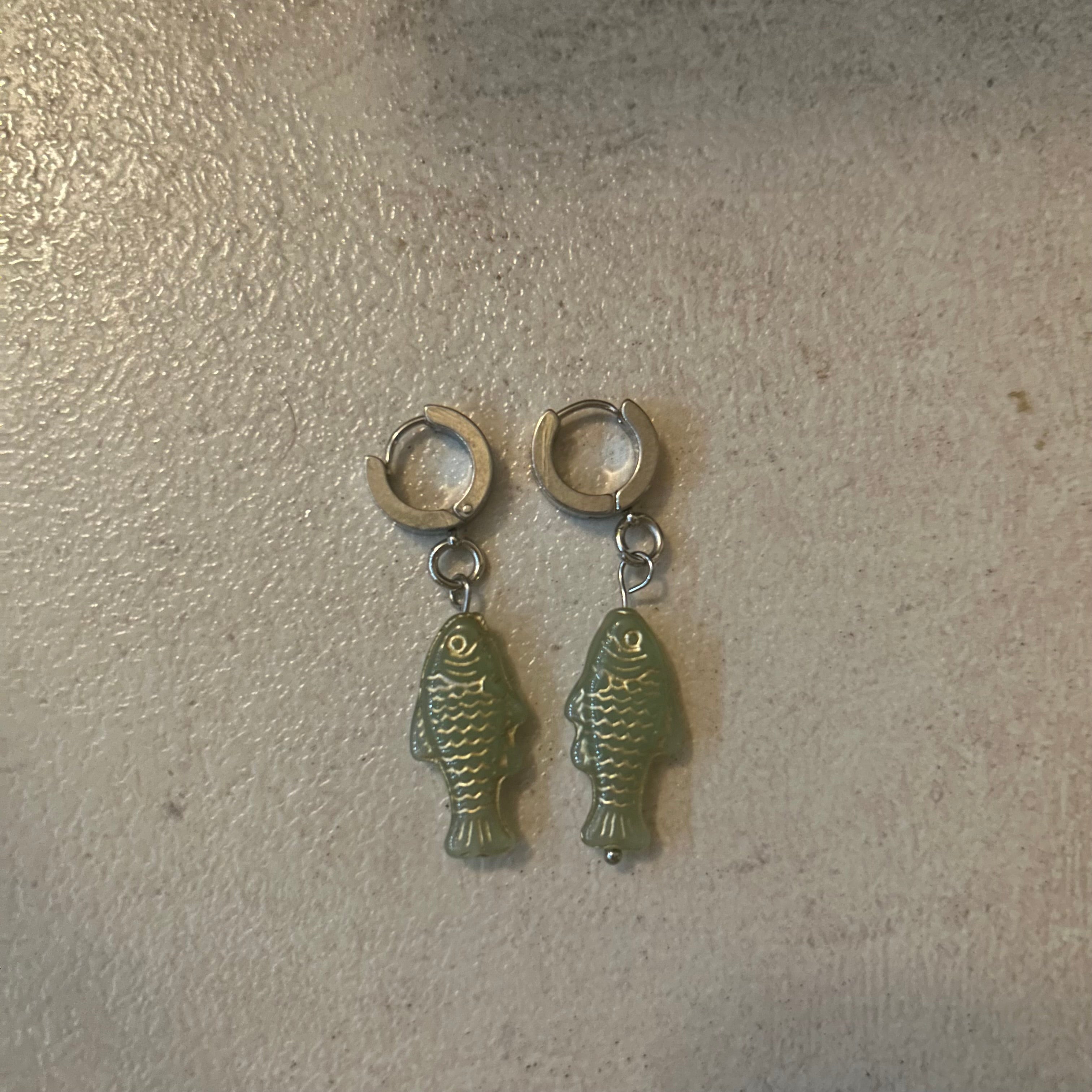 Gold on LIGHT green fish earrings