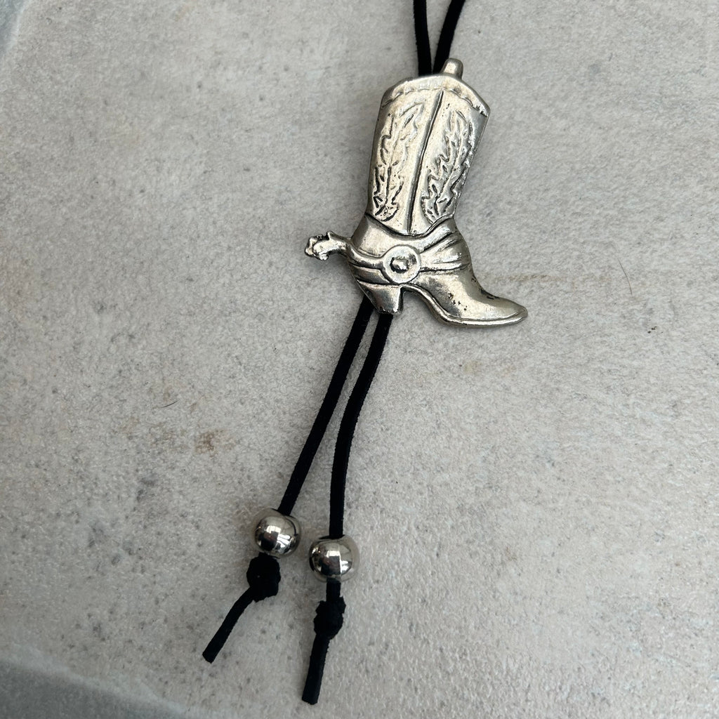 Handmade bolo tie with vintage cowboy boot pendant and upcycled beads