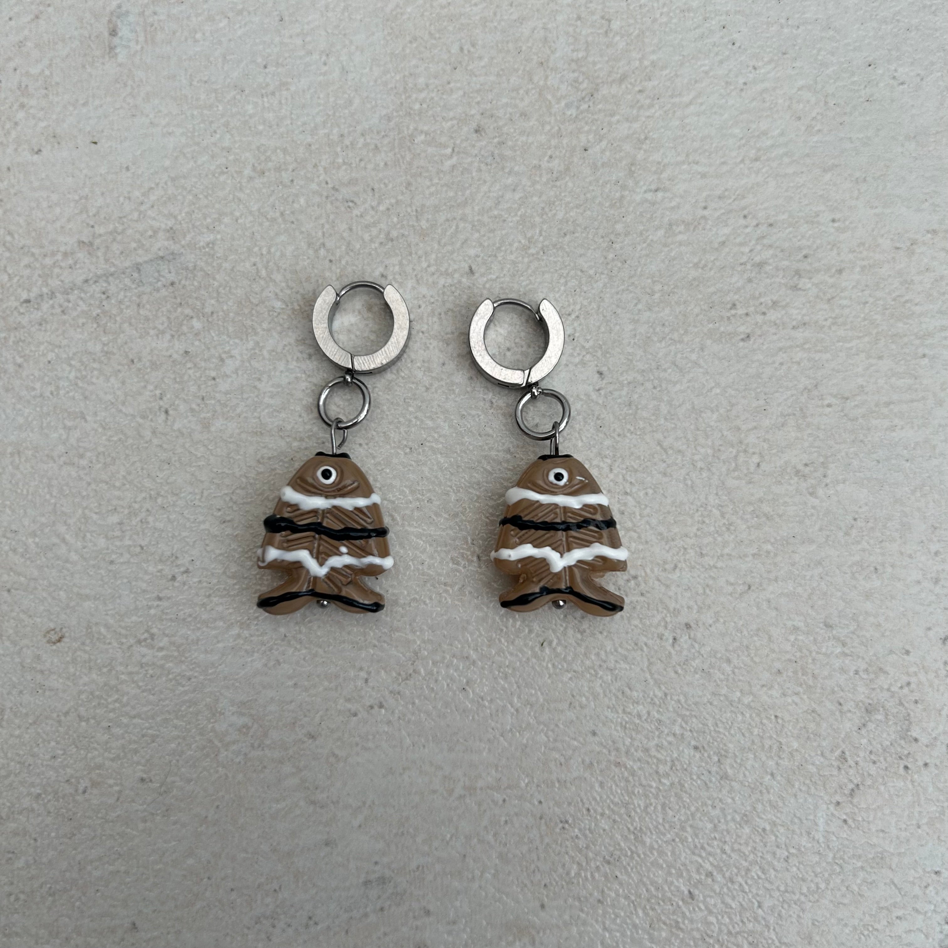 Brown fish squiggle earrings