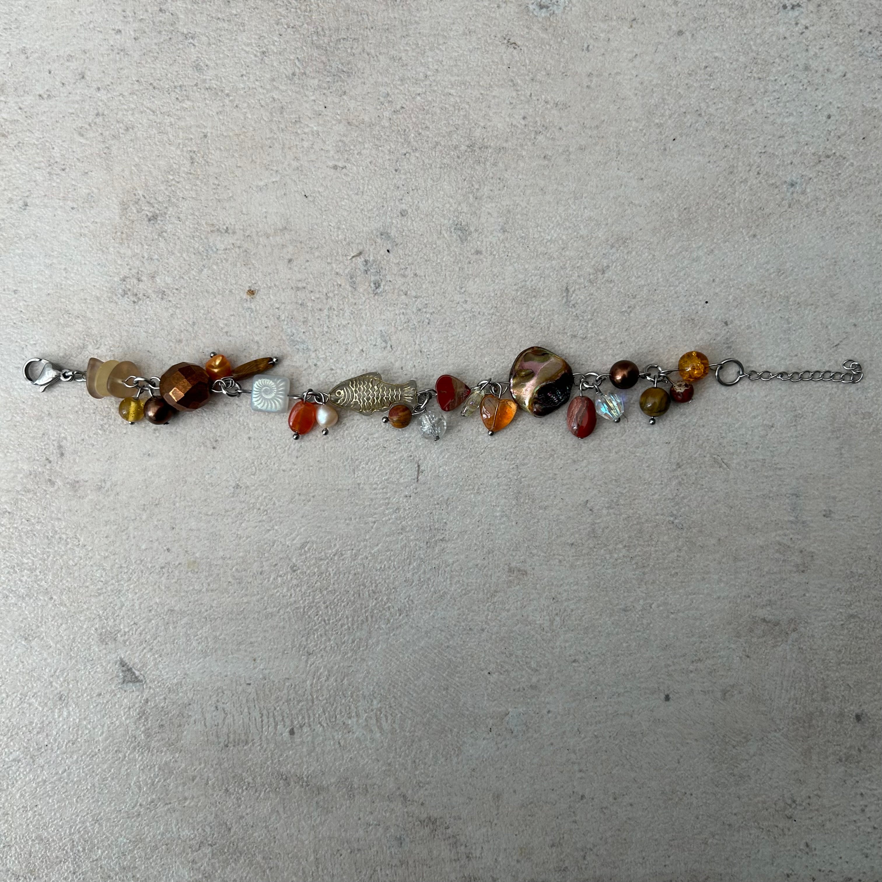 brown and gold cluster clutter fish bracelet