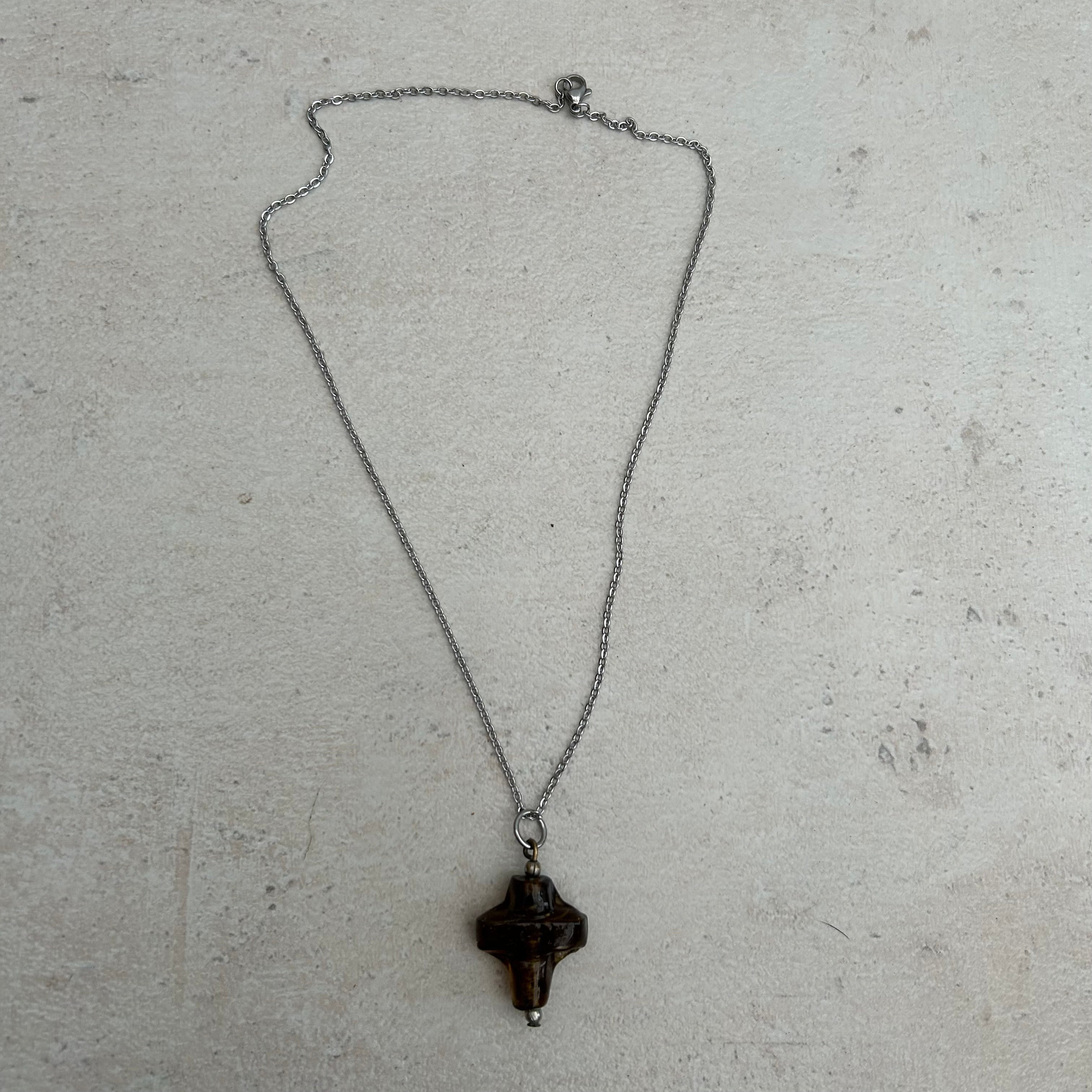 Brown glass cross necklace