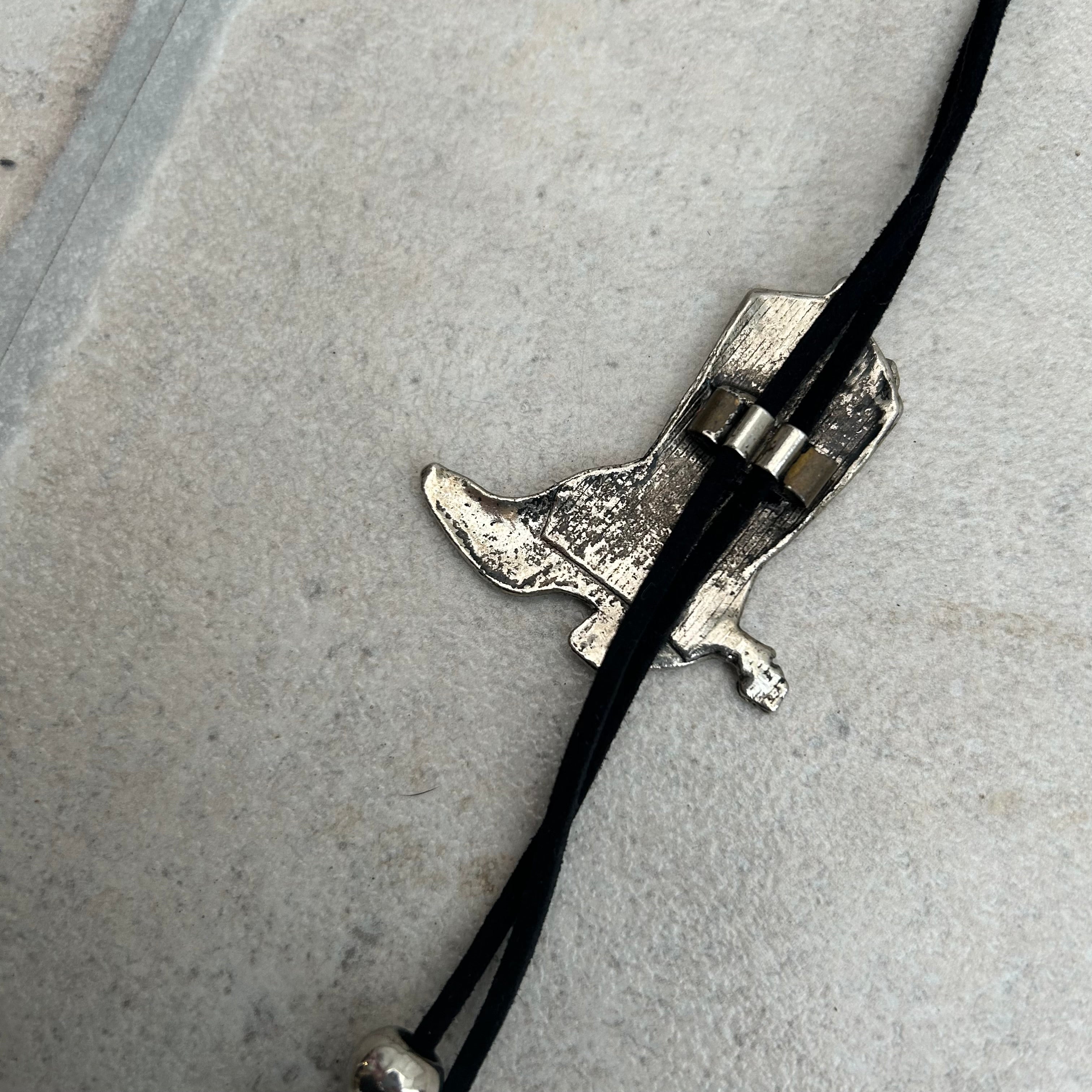 Handmade bolo tie with vintage cowboy boot pendant and upcycled beads