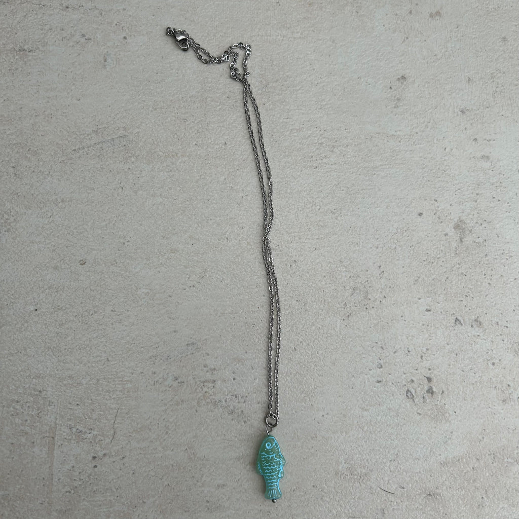 Blue on green fish necklace