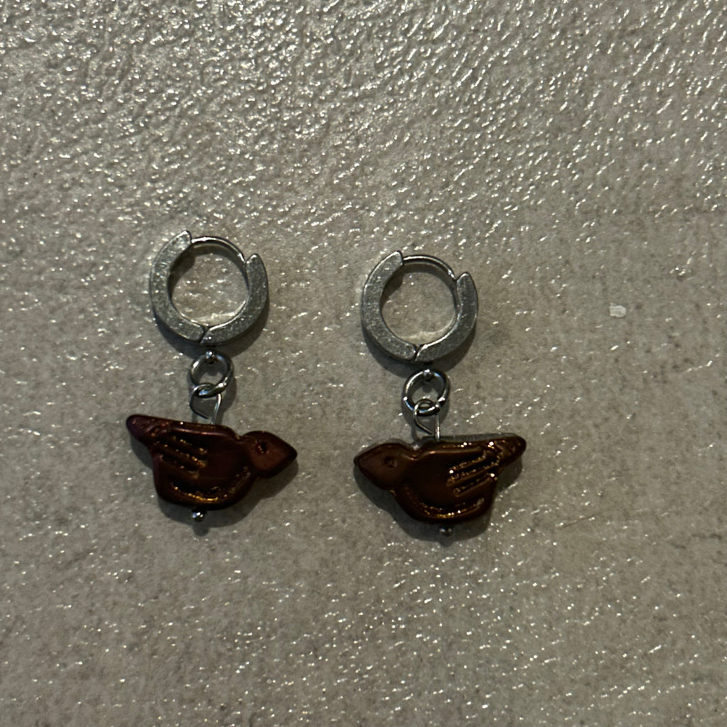 Bronze orange bird Huggies