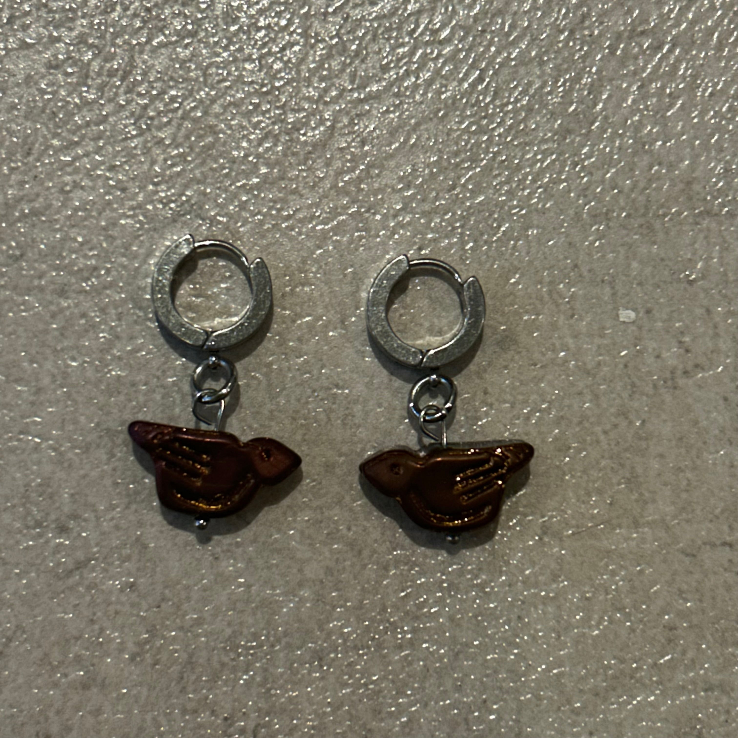 Bronze orange bird Huggies