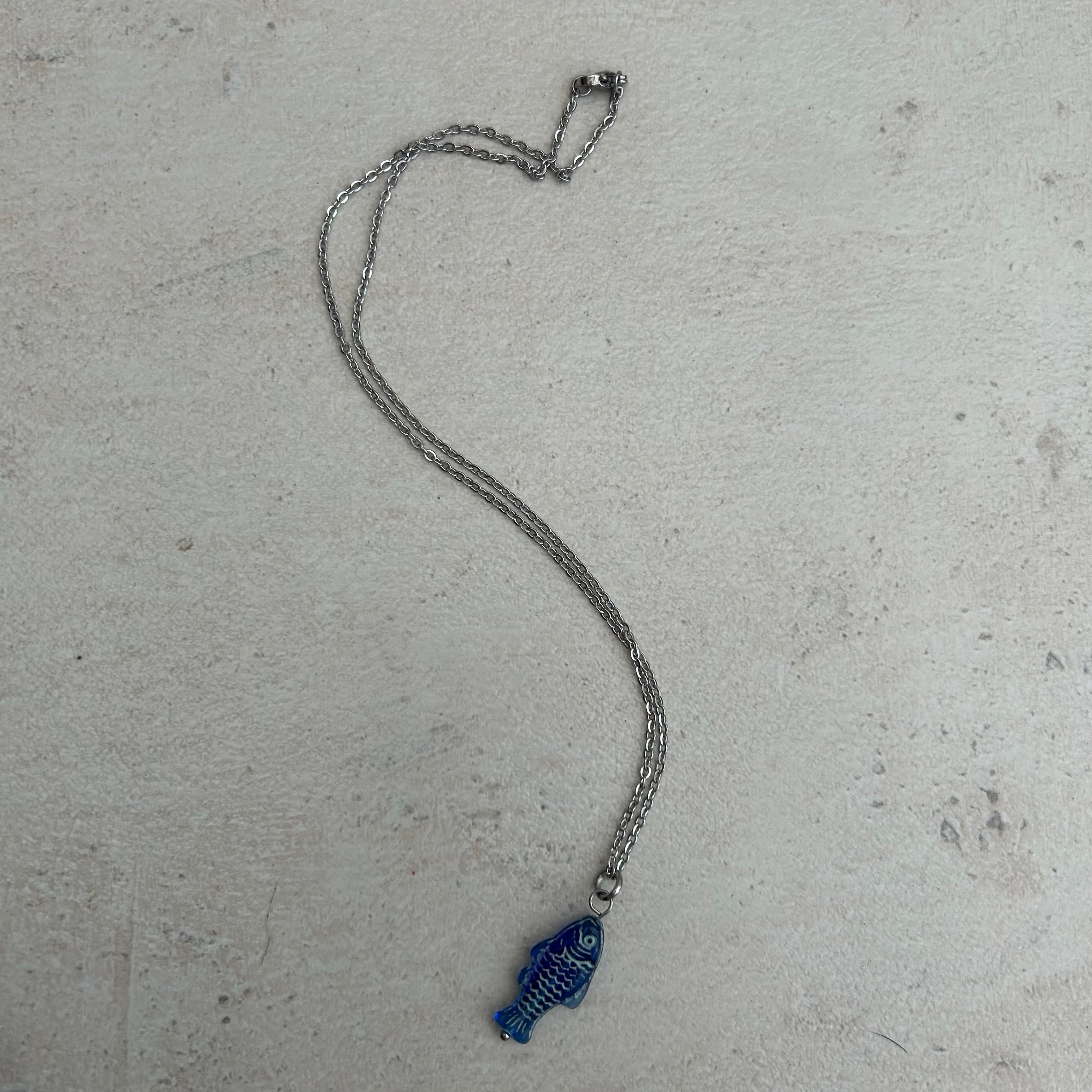 Light blue on dark blue fish necklace