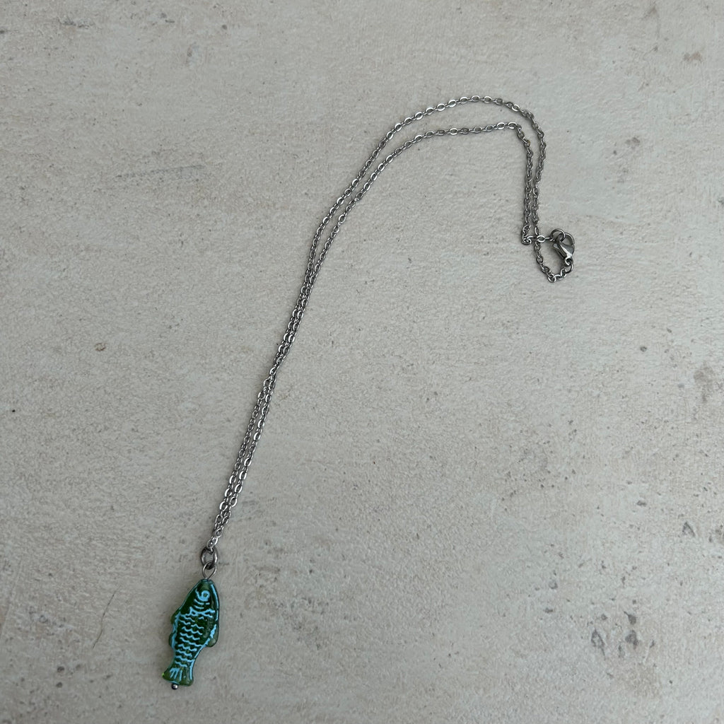 Blue on green fish necklace
