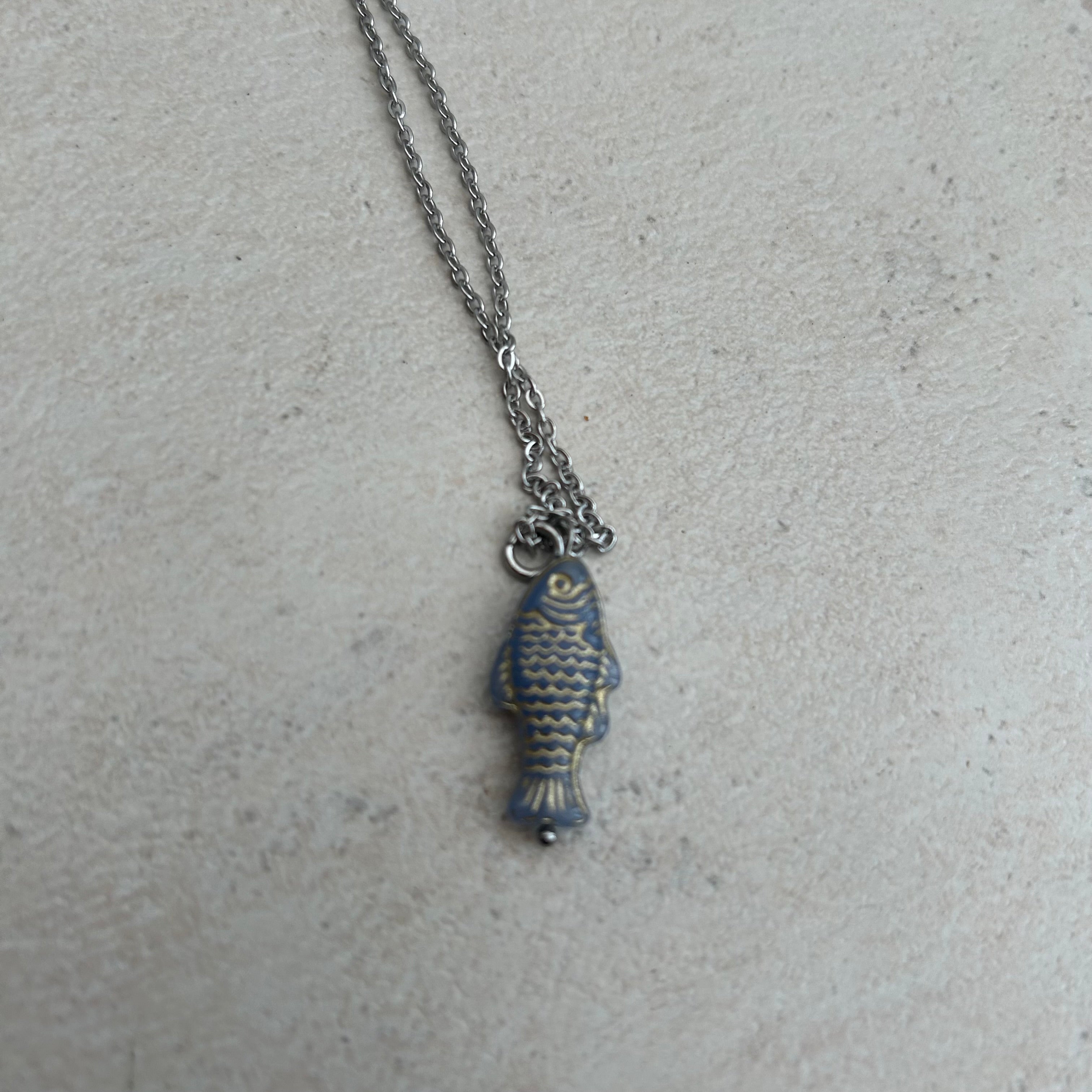 Gold on grey fish necklace