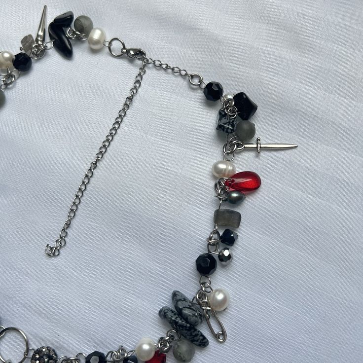 'Full of Woe' black, red and silver charm and glass cluster clutter necklace